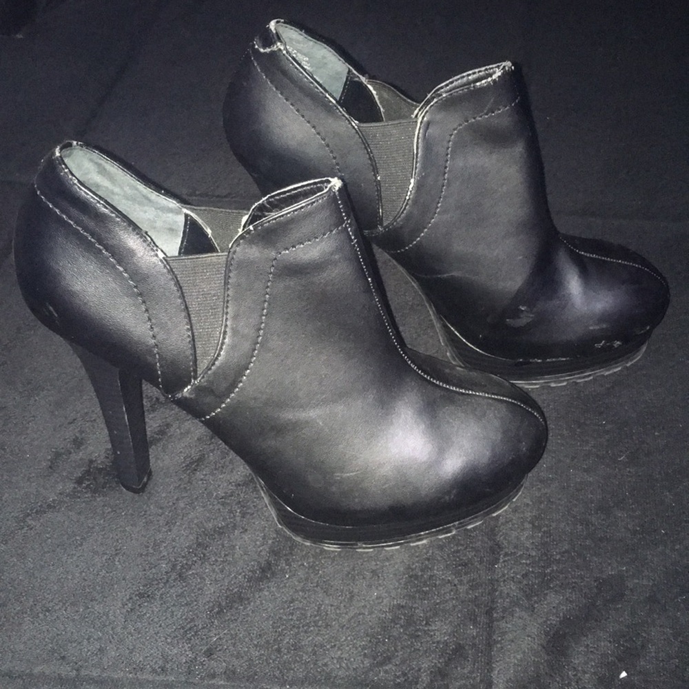 Black Jennifer Lopez stiletto boot heels